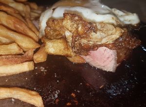 Una foto de Bistec a caballo