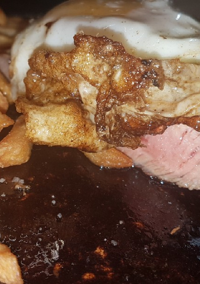 Una foto de Bistec a caballo