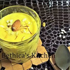 A picture of Flattened Rice - Yoghurt - Mango Dessert.