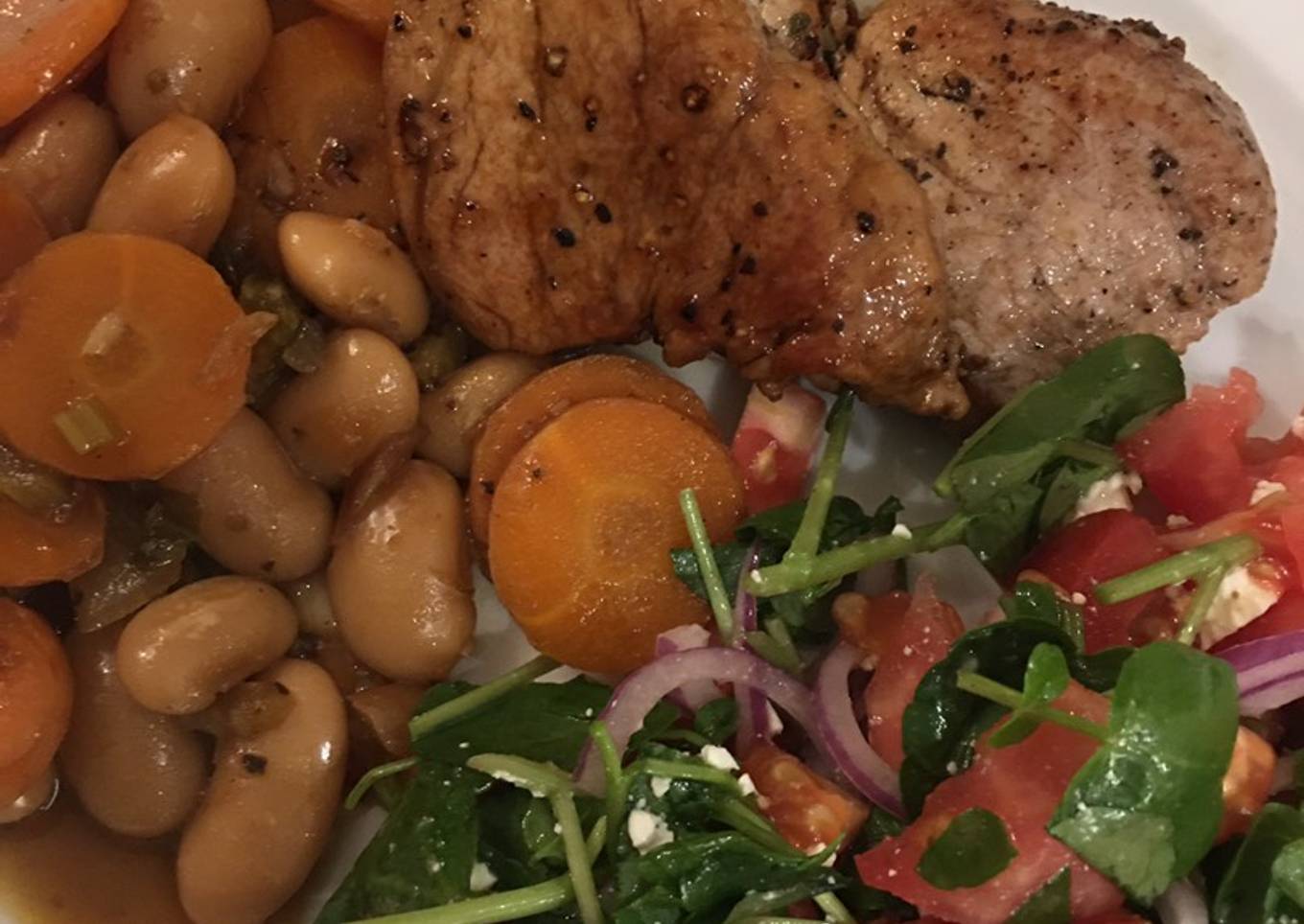 Pork medallions with lemony butter beans