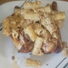 A picture of Cornish Hen with Cheesy Pasta.