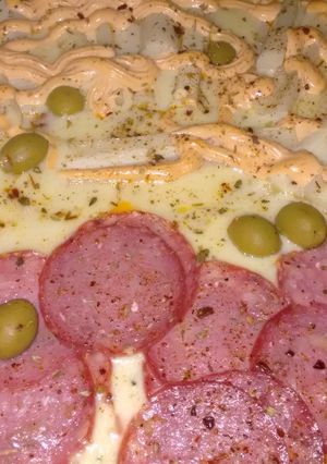 Una foto de Pizza al molde
