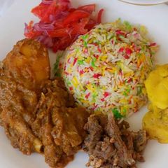 A picture of Colored Rice with Wet fried Beef.