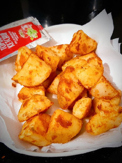 A picture of Potato wedges.