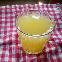 A picture of Orange and ginger juice.