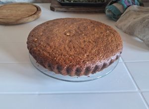 Una foto de Torta suave de Cocoa y naranja, miel 🍯🍊🍫