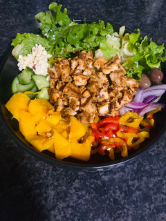 A picture of Tropical Chicken Poke Bowl.