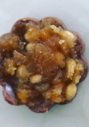A picture of Gur dhana chocolate bitesWhen its engagement or wedding jaggery and coriander seeds are offered.