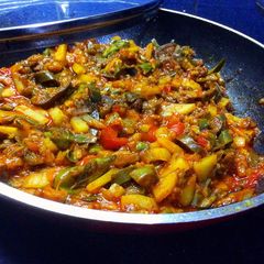 A picture of Brinjal potato with ketchup.