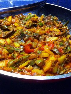A picture of Brinjal potato with ketchup.