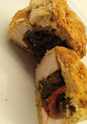 Una foto de Cuadraditos de pollo relleno