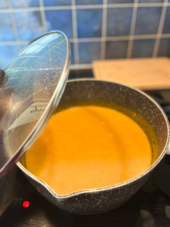 A picture of Curried leek and sweet potato soup.