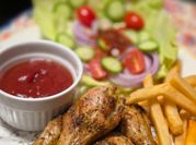 A picture of baked drumsticks