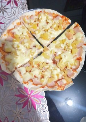 Una foto de Pizza hawaiana 🍕🍍
