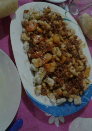 Una foto de Ñoquis de papa y queso
