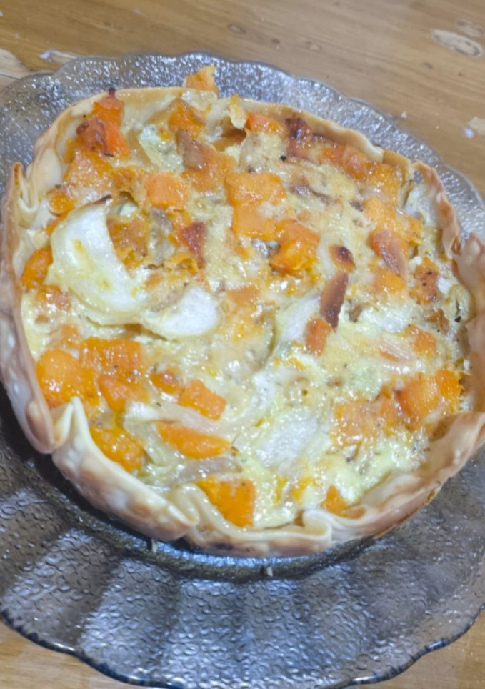 Una foto de Tarta de zapallo y cebolla caramelizada
