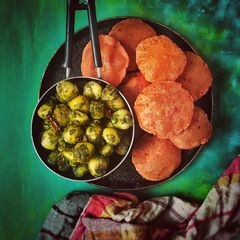 A picture of Baby potatoes in coriander curry paste.