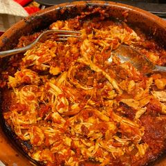 A picture of Spicy pulled chicken.
