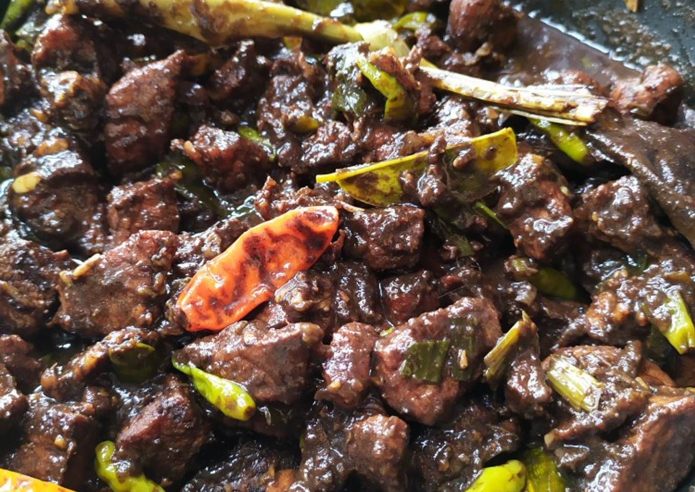 Daging Babi masak Pangi (kluwak) Tollo Pammarasan khas Toraja