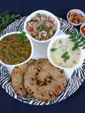 Gujarati thali: Jowar rotla with baigan bharta, pulav and kadhi