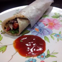 A picture of Classic Arabian Shwarma/Chicken Pita Roll.