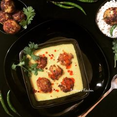 A picture of Cabbage Kofta Kadhi.