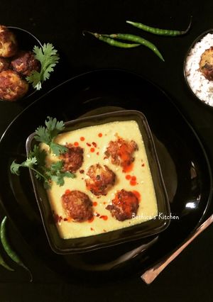 A picture of Cabbage Kofta Kadhi.