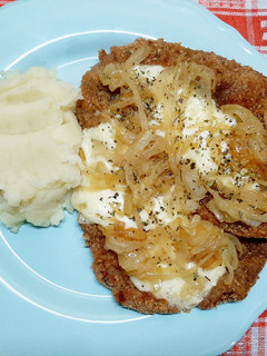 Una foto de Milanesas de carne a la fugazzeta