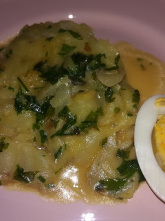 Una foto de Bacalao en salsa verde