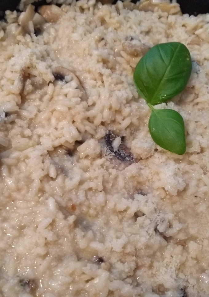 Una foto de Risotto de pollo con champiñones