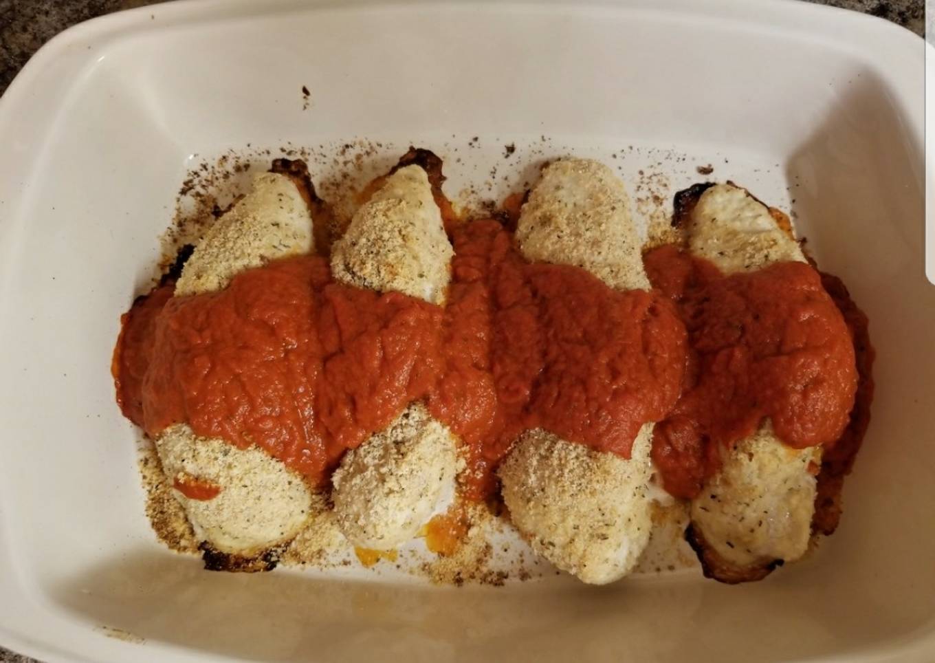 Light chicken in parmesan skin