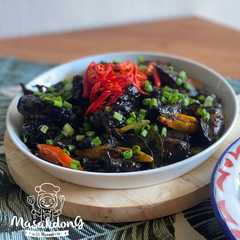 A picture of Cumi Minyak Hitam Khas Melayu.