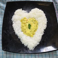 A picture of Veg Sagu with rice.
