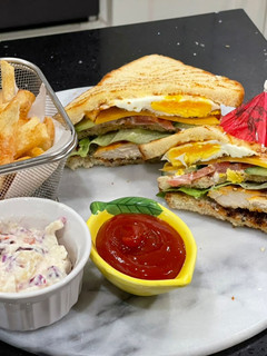 A picture of Chicken tikka club Sandwich.