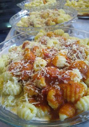 Una foto de Ñoquis de papa con salsa fileto y crema