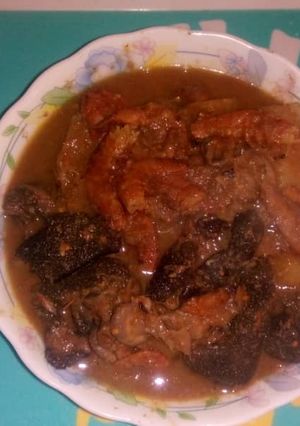 A picture of Assorted meat peppersoup with yam.