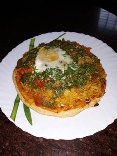 ডিম ম্যাগি পিজ্জা (dim maggi pizza recipe in Bengali) রেসিপির প্রধান ছবি
