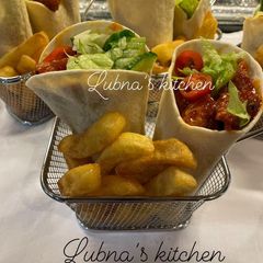 A picture of Coronation Chicken Wrap with Fries / Chips:.