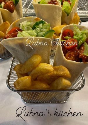 A picture of Coronation Chicken Wrap with Fries / Chips:.