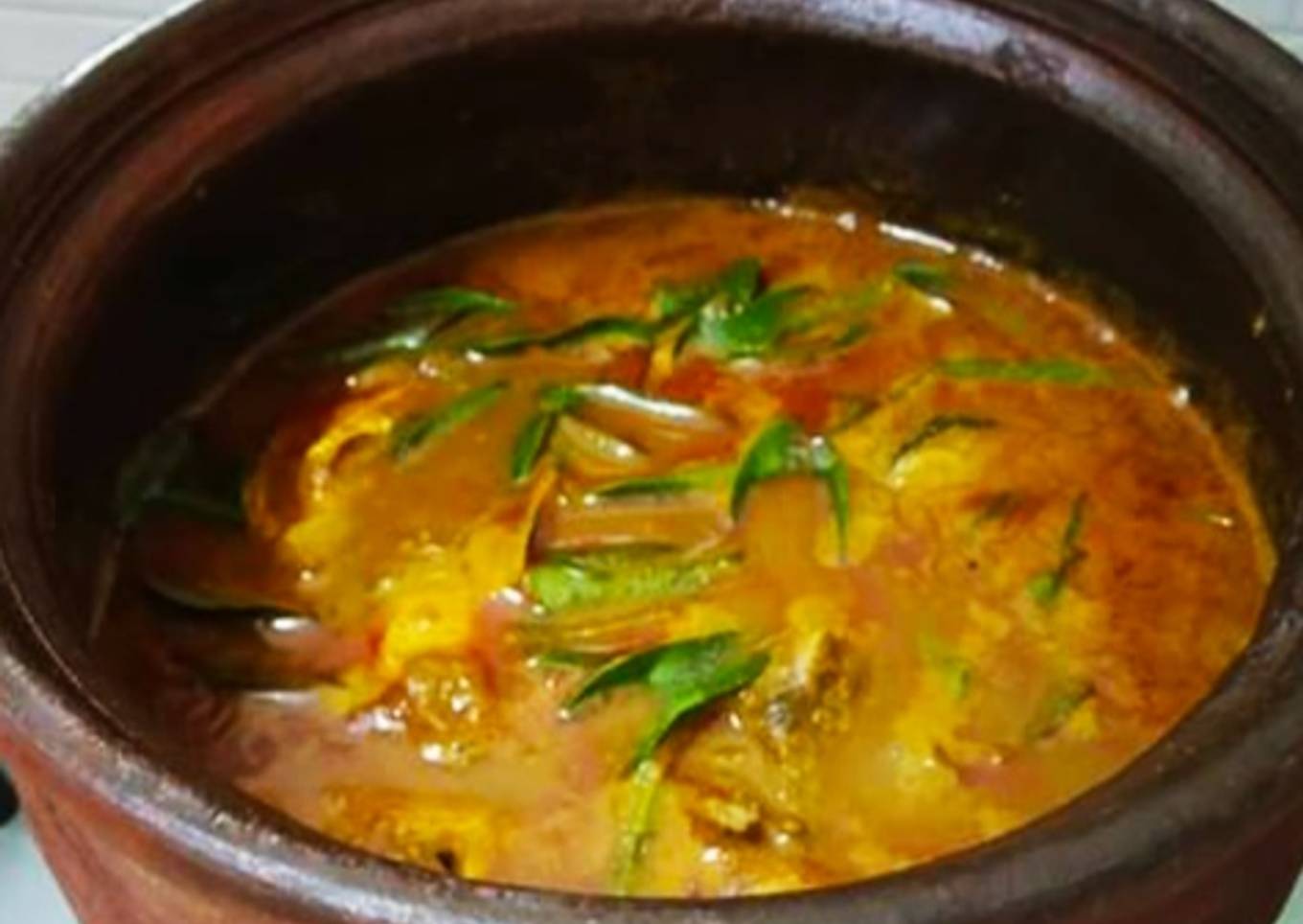 Fish curry in mud pot