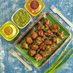 A picture of Phodshi Kolambi Chi Bhaji (Grassy Leafy Veg And Shrimp Fritters).