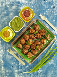 A picture of Phodshi Kolambi Chi Bhaji (Grassy Leafy Veg And Shrimp Fritters).