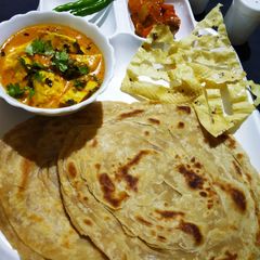 Dum paneer handi masala with Lachha Paratha A picture of Dum paneer handi masala with Lachha Paratha.