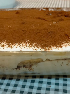 Una foto de Tiramisú con quequitos
