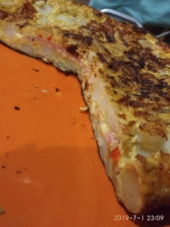 Una foto de Tortilla de papa rellena
