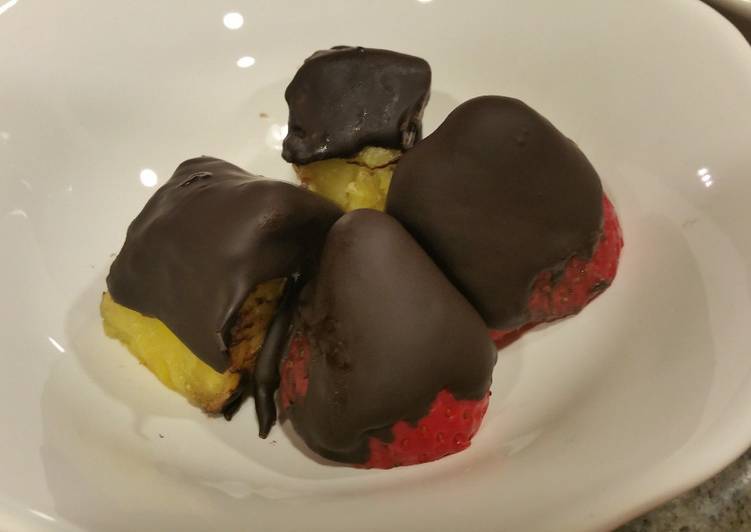 Fruit coated with dark crunchy chocolate