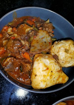 A picture of Beef vegitable stew with dombolo.