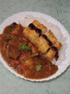 A picture of Tofu Katsu Curry.