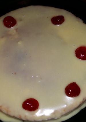 A picture of Butter cake with white chocolate ganache.