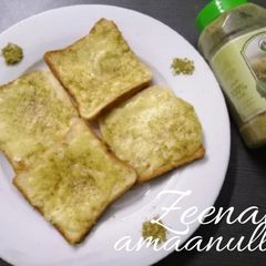 A picture of Cheesy Thyme Bread Open Sandwiches.